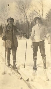 C.E. Mortureux (left) and Shuldum Hill, a pioneer member of Ottawa Ski Club in Gatineau Hills, QC c.1920