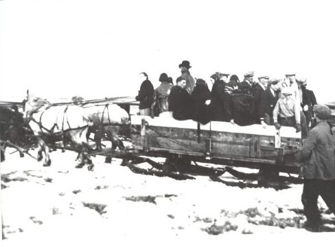 Camrose Ski Club horse drawn sleigh with skiers