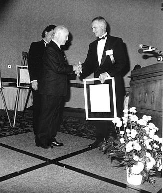 Bruce Carnall and Canadian Ski Museum Chair, Erle Bergh, at 1991 Canadian Ski Hall of Fame Induction Ceremony