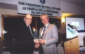 Jerry Johnston receiving Pat Ramage Award from David Pym, Managing Director for the Canadian Snowsports Association, at 2004 Canadian Ski Hall of Fame Induction Ceremony. 