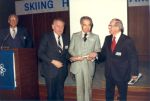 1983 Canadian Ski Hall of Fame Induction Ceremony [L to R]: Mart Karnahan, Senator Ray Perrault, inductee Dennis Adkin, Louis Grimes