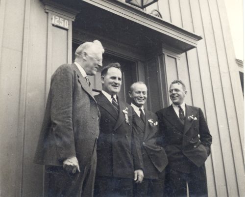 [L to R]: Harry Wade Hicks, Roger Langley (President of US Ski Association), ?, ?