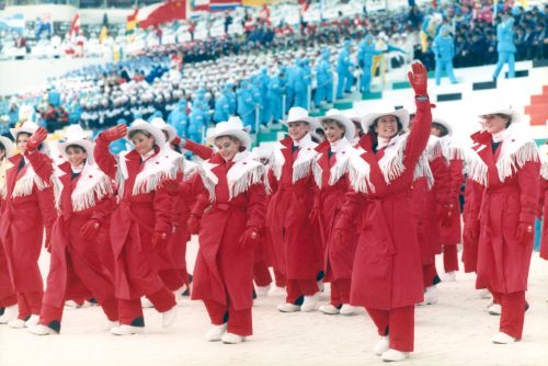 Opening ceremonies for 1988 Olympic Winter Games in Calgary, AB. Laurie Graham (in front, waving to crowd