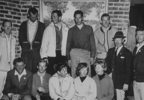 Andy Tommy (standing, far right)