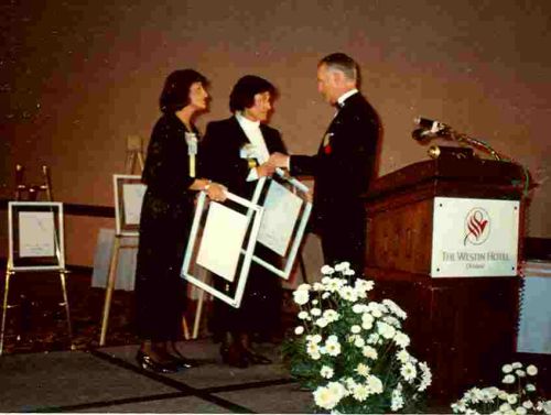 Sharon and Shirley Firth with Canadian Ski Museum Chair, Erle Bergh, at 1990 Canadian Ski Hall of Fame Induction Ceremony