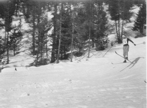 W.B. Thompson near finish line of 18km cross country skiing event at 1928 St. Moritz Olympic Winter Games