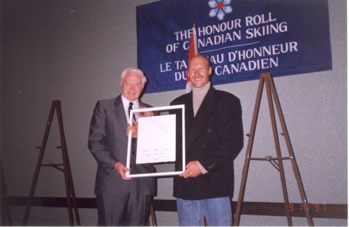 Keith Nesbitt, Canadian Ski Museum Chair, with Inductee Jean-Marc Rozon at 1997 Canadian Ski Hall of Fame Induction Ceremony