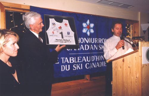 Inductee Myriam Bédard (left) and Canadian Ski Museum Chair, Chris Edgell (center), at 2001 Canadian Ski Hall of Fame Induction Ceremony.