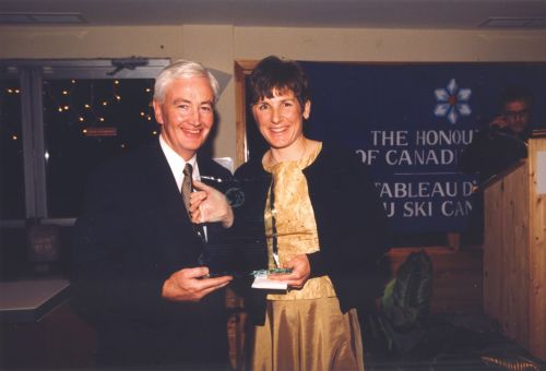 Canadian Ski Museum Chairman, Chris Edgell, and Kate Pace at 2001 Canadian Ski Hall of Fame Induction Ceremony.