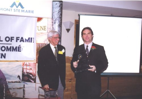 Inductee John Smart and Canadian Ski Museum Chair, Arnold Midgley (left), at 2003 Canadian Ski Hall of Fame Induction Ceremony.