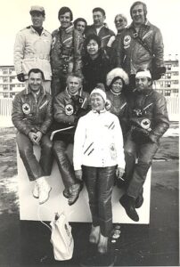 Pat Ramage (standing) with Sport Canada Directorate at 1972 Saporro Olympic Winter Games.