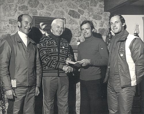 [L to R]: Bill Henderson (Simpsons Sears Manager), Keith Nesbitt (Executive Director of Canadian Ski Association), Jean-Claude Killy, Gary Clarke (President of Mont Ste-Marie) All proceeds from lift-ticket day sales at Mont Ste-Marie were donated to National Alpine Ski Team. 