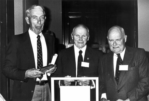 [L to R]: Rae Grinnell (inductee), W.B. Thompson, and Canadian Ski Museum Chair, Bill Tindale, at 1987 Canadian Ski Hall of Fame Induction Ceremony. 