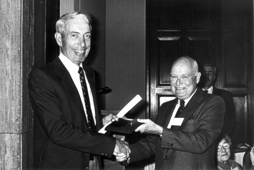 Rae Grinnell (inductee) and Canadian Ski Museum Chair, Bill Tindale, at 1987 Canadian Ski Hall of Fame Induction Ceremony
