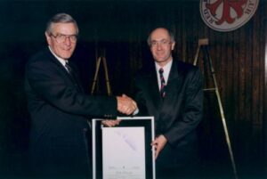 John Johnston (right) and Canadian Ski Museum Chair, Grant Boyd, at 1995 Canadian Ski Hall of Fame Induction Ceremony