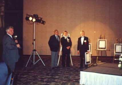 Inductee Andy Tommy, ?, and Canadian Ski Museum Chair, Erle Be