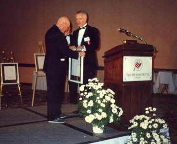 Inductee Bill Tindale (left) and Canadian Ski Museum Chair, Erle Bergh, at 1990 Canadian Ski Hall of Fame Induction Ceremony