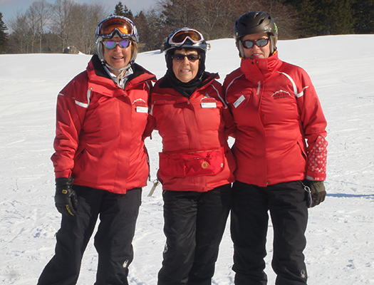 Ski instructor volunteer and CSIA Hall of Fame member Ruth Boutillier (centre) is perhaps best known as Cape Breton ultimate fundraiser.